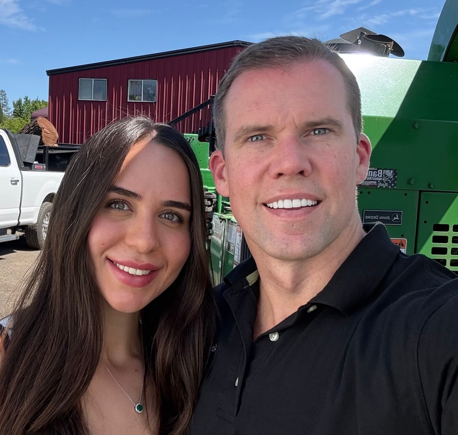 David and Burcu, owners of Home Service Direct, at a tree company's yard